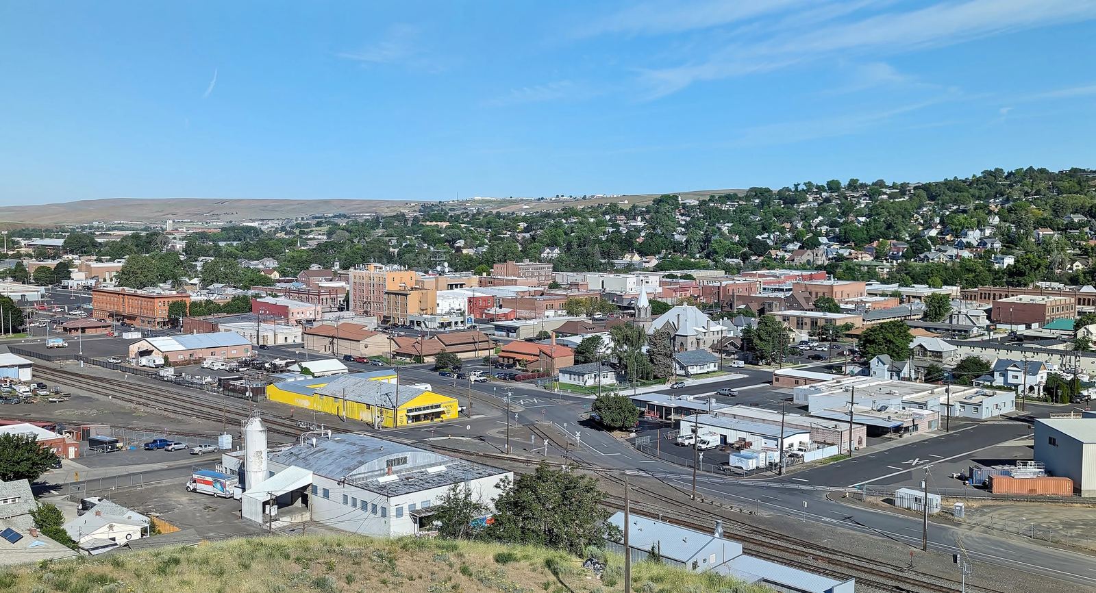 Panoramic view across downtown Pendleton and the rolling hills of Eastern Oregon